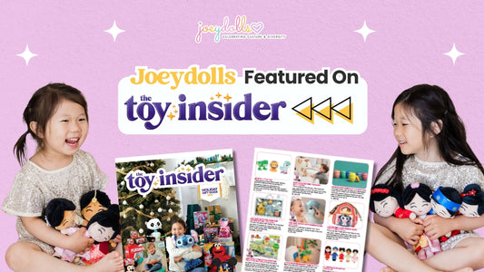 Two young girls smiling while holding Joeydolls plush dolls, with Toy Insider’s 2025 Holiday Gift Guide shown. Text reads “Joeydolls Featured on Toy Insider."