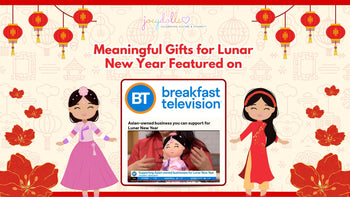 Announcement graphic highlighting Joeydolls' appearance on Breakfast Television. The design features Lunar New Year themes with red lanterns and traditional dress, showcasing the brand's mission to celebrate culture and diversity.