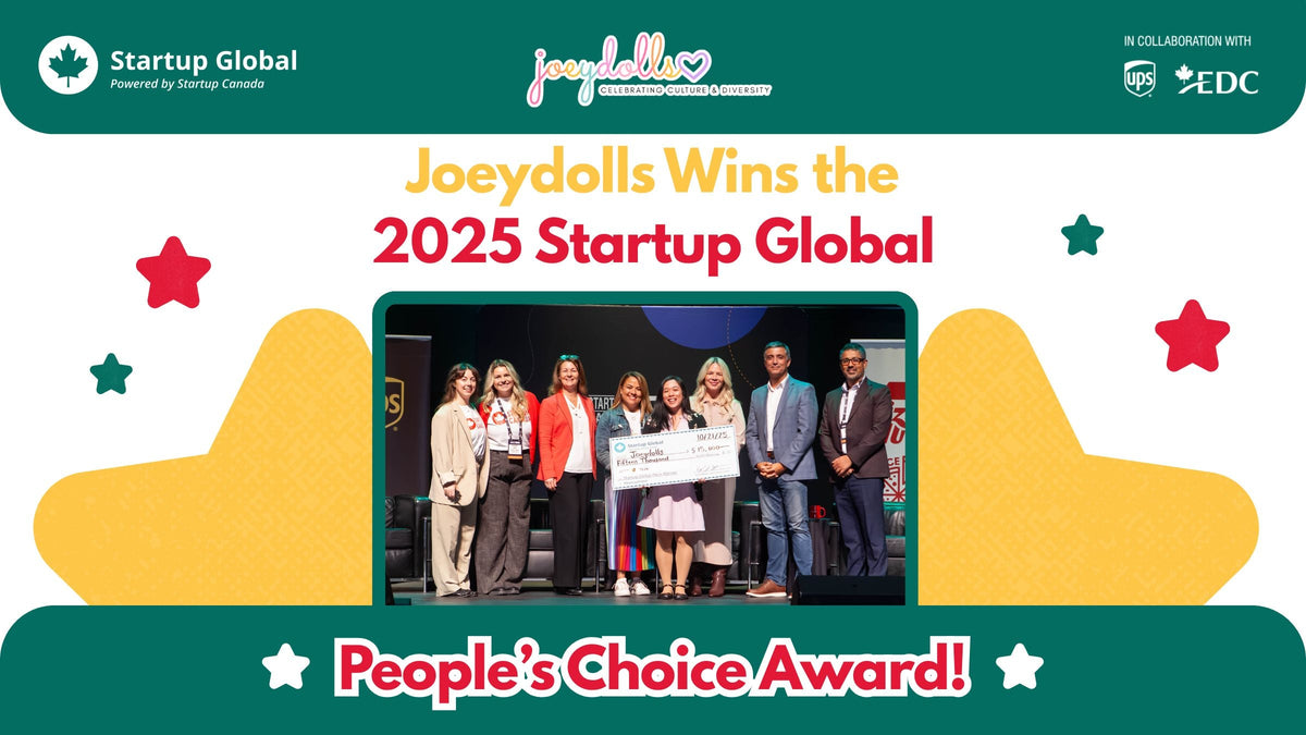 Joeydolls founder holding a large $15,000 check at the Startup Canada event backdrop, celebrating the People’s Choice Award win.