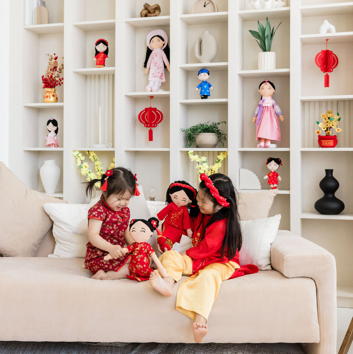 A family celebrating together with their Joeydolls