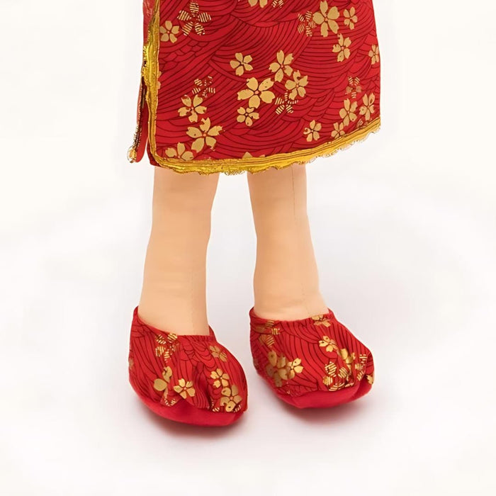 Chinese Mei doll shoes featuring red fabric shoes with gold floral patterns.