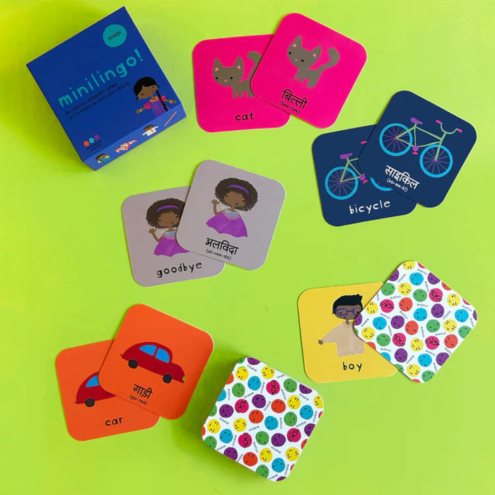 Memory card game with Hindi English flashcards featuring illustrated words like cat, bicycle, and car