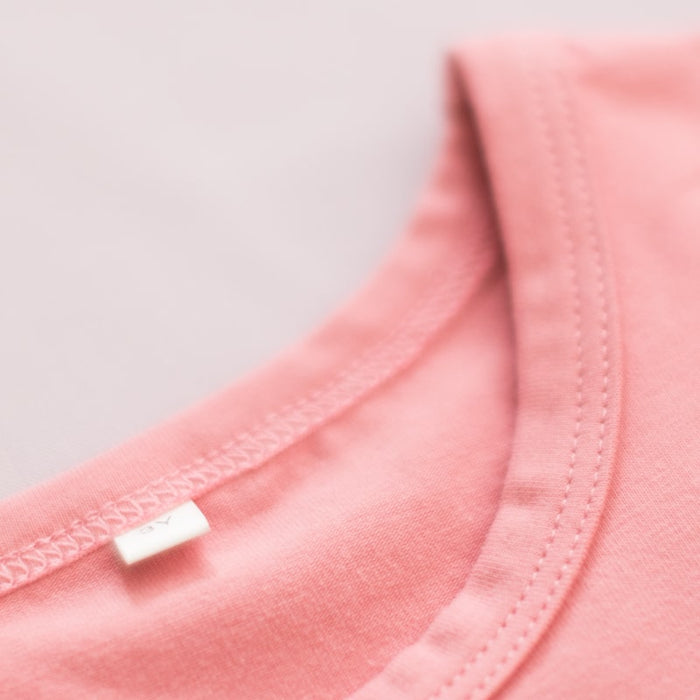 Close-up of the neckline of the Proudly Asian women’s t-shirt showing soft cotton fabric, stitched collar detail.