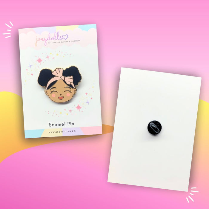 Joeydolls Cheerful Jasmine gold enamel pin displayed on a Joeydolls card, featuring a smiling girl character with double buns and a pink headband, with the back showing a rubber clutch.
