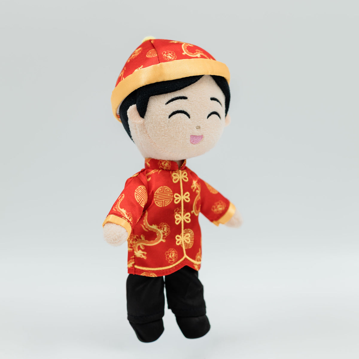 Angled view of the gold dragon embroidery on Jun's red tang jacket, Joeydolls Chinese boy doll