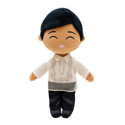 Dressed in a traditional Barong Tagalog, this Filipino Boy Doll celebrates Filipino heritage with charming embroidered details and a cheerful smile. Crafted from soft plush materials, he is designed to inspire cultural pride and meaningful play.