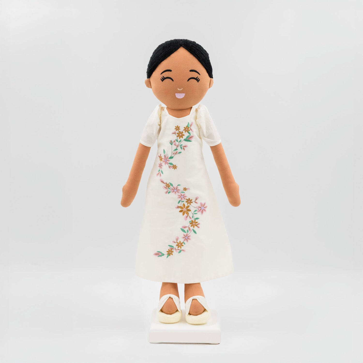 Malaya Filipina cultural doll wearing a traditional Filipiniana dress with butterfly sleeves and embroidered floral details