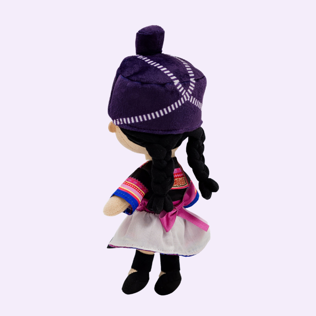Side back view of Joeydolls Maiv Hmong doll with long braids and head wrap