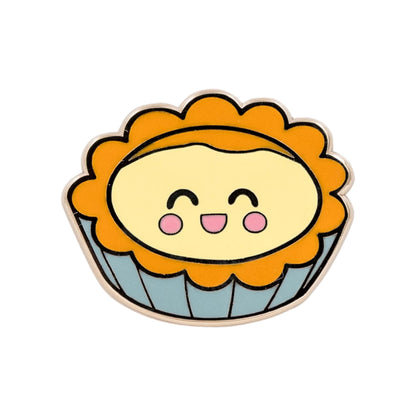 Dàn Tǎ Chinese egg tart enamel pin featuring a smiling egg tart with a golden crust and custard filling.