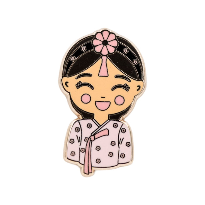 Joeydolls Korean Danbi gold enamel pin featuring a smiling girl wearing a pink hanbok with ribbon details and a traditional jokduri headpiece.