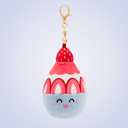 Korean bingsu Food Pals bag charm featuring a smiling bowl with red and white shaved ice, strawberry details, and a gold clasp