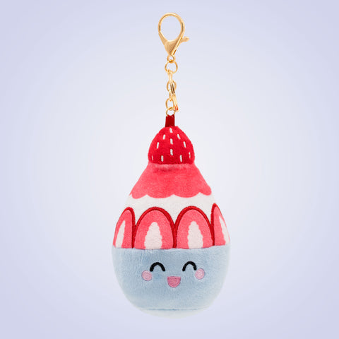 Korean bingsu Food Pals keychain featuring a smiling bowl with red and white shaved ice, strawberry details, and a gold clasp