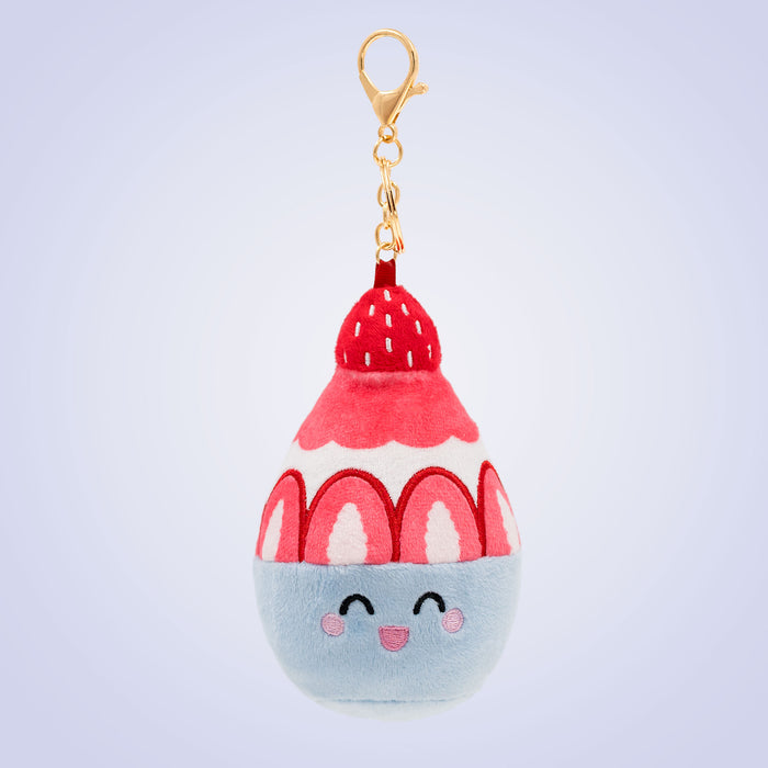 Korean bingsu Food Pals keychain featuring a smiling bowl with red and white shaved ice, strawberry details, and a gold clasp