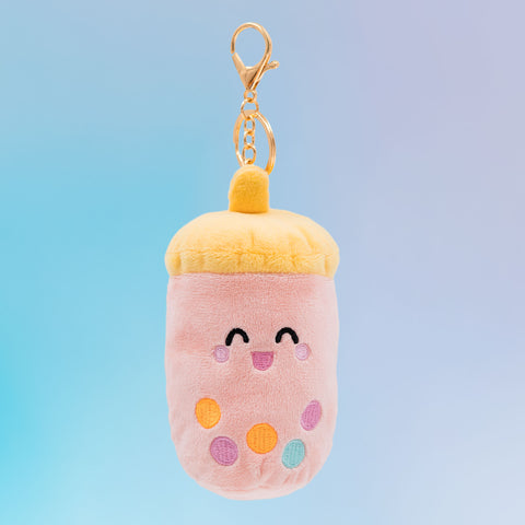 Taiwanese boba Food Pals keychain featuring a smiling pink cup, a yellow lid, colorful tapioca pearls, and a gold clasp