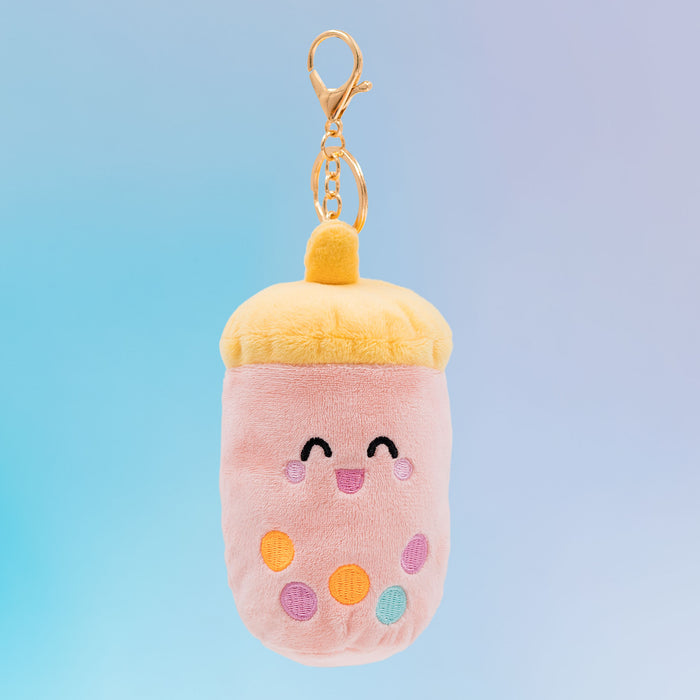 Taiwanese boba Food Pals keychain featuring a smiling pink cup, a yellow lid, colorful tapioca pearls, and a gold clasp
