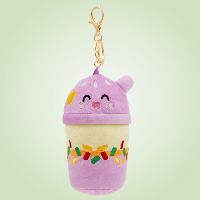 Filipino halo-halo Food Pals keychain featuring a smiling purple top, colorful toppings, a layered dessert design, and a gold clasp