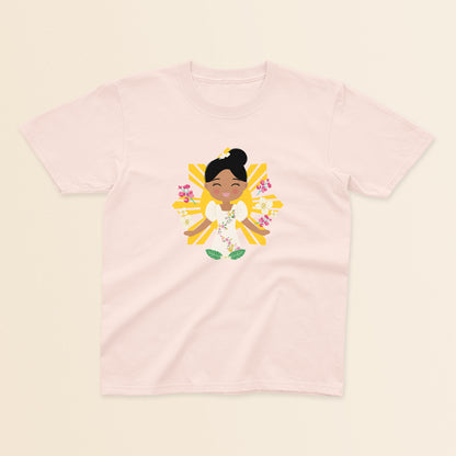 Filipina Cultural Celebration baby and kids t-shirt in light pink with a graphic of a smiling girl wearing a floral Filipiniana dress, hair in a bun, set against a Filipino sun and surrounded by floral elements.
