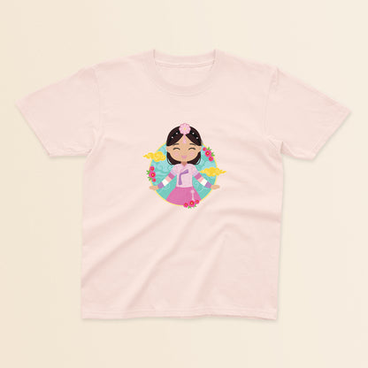Korean Cultural Celebration baby and kids t-shirt in light pink with a graphic of a smiling girl with long hair adorned with a daenggi ribbon and a jokduri headpiece, wearing a pink hanbok with a norigae ornament, set against a circular background with floral elements and traditional patterns.