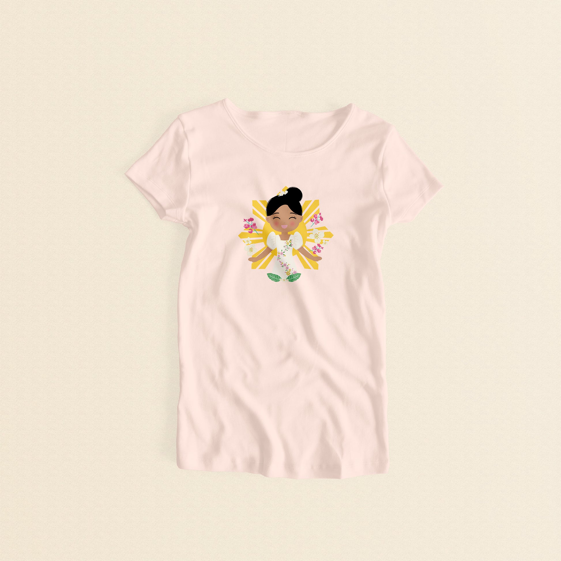 Filipina Cultural Celebration women’s t-shirt in light pink with a graphic of a smiling girl wearing a floral Filipiniana dress, with hair in a bun, set against a yellow sun and floral elements.