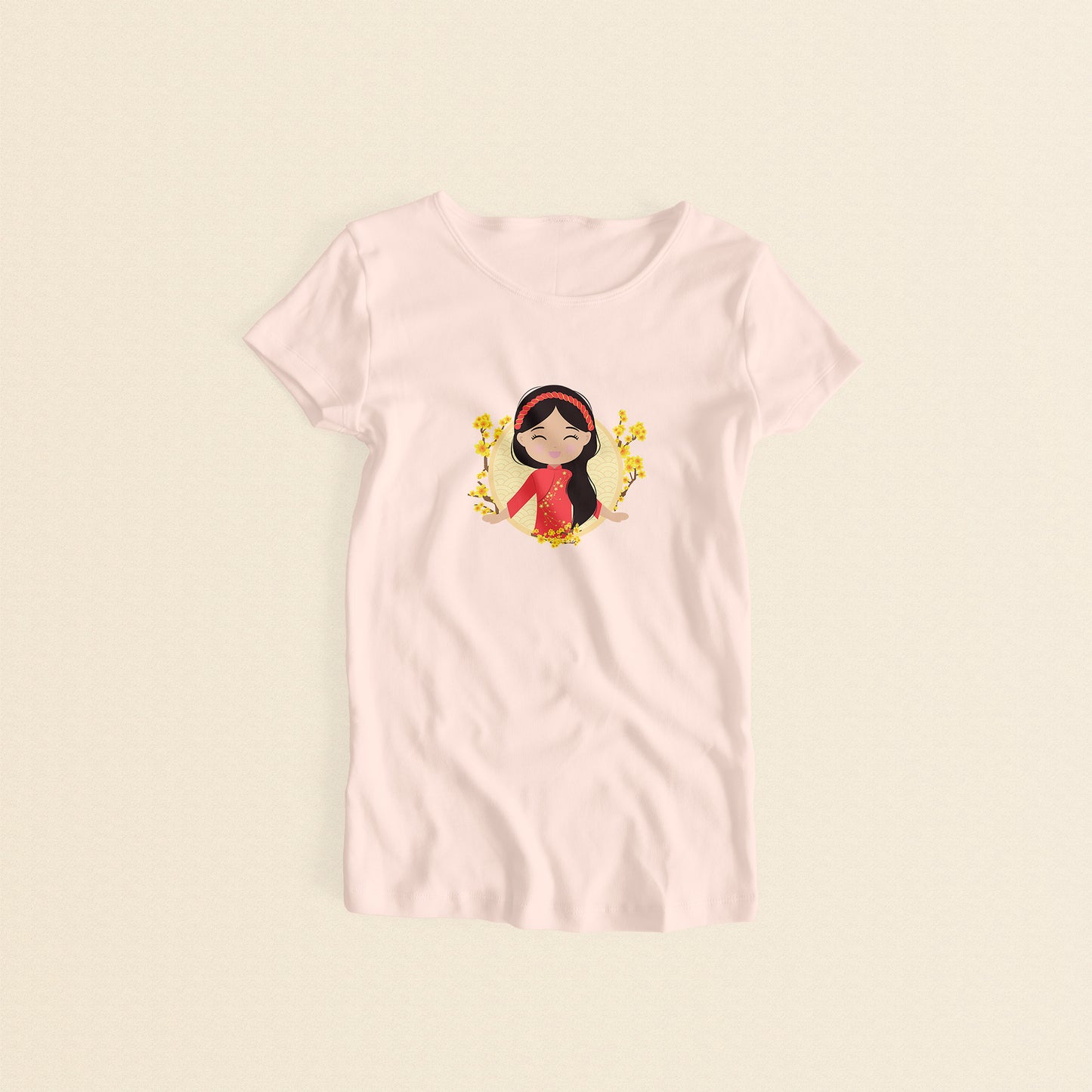 Vietnamese Cultural Celebration women’s tee in light pink featuring a printed illustration of a smiling girl with long black hair, wearing a red áo dài with delicate mai flower details and a traditional khăn đóng headpiece, set against a circular Seigaiha wave pattern background with yellow mai flower branches on both sides.