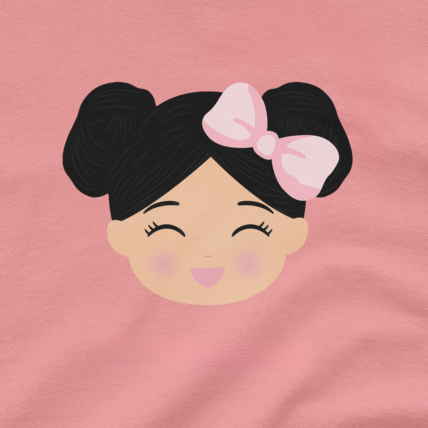 A close-up of a pink fabric surface featuring a Joeydolls Icon graphic of a girl's face with black hair in two buns and a pink bow.