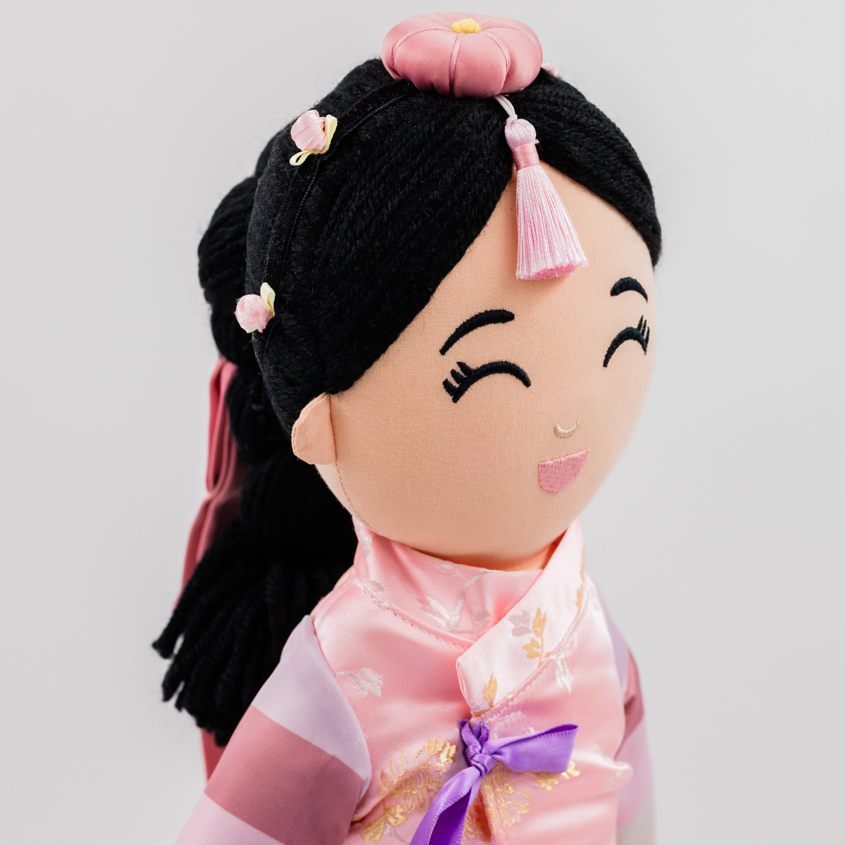 Close-up of the jokduri headpiece and floral hair details on Joeydolls Danbi