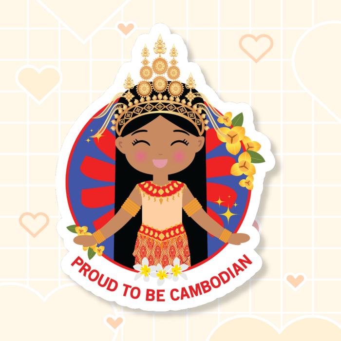 Proud to Be Cambodian die-cut sticker featuring a smiling girl with long black hair, wearing a sampot skirt and a regal mokot ksatrey crown, set against a circular red and blue sunburst background, adorned with champei and yellow flowers, with “Proud to Be Cambodian” text below.