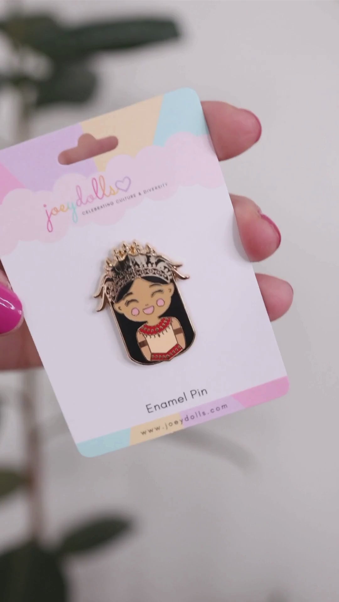Joeydolls Cambodian Soriya enamel pin on a Joeydolls display card, gently moving to show its traditional outfit details, mokot ksatrey crown, and glossy finish.